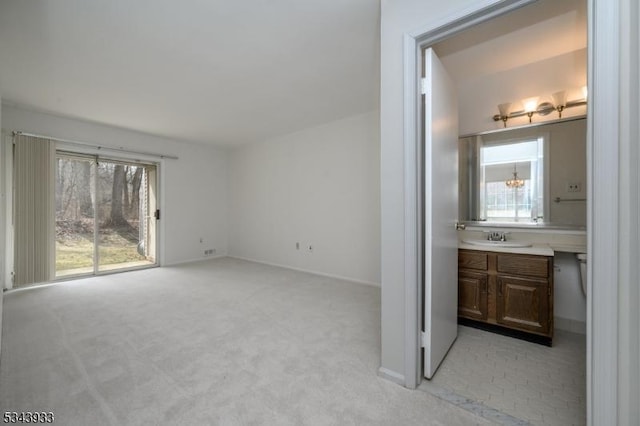 interior space with plenty of natural light and vanity