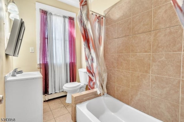 bathroom featuring a baseboard heating unit, toilet, shower / bath combo, tile patterned floors, and vanity