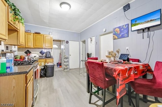 dining area featuring light wood-type flooring