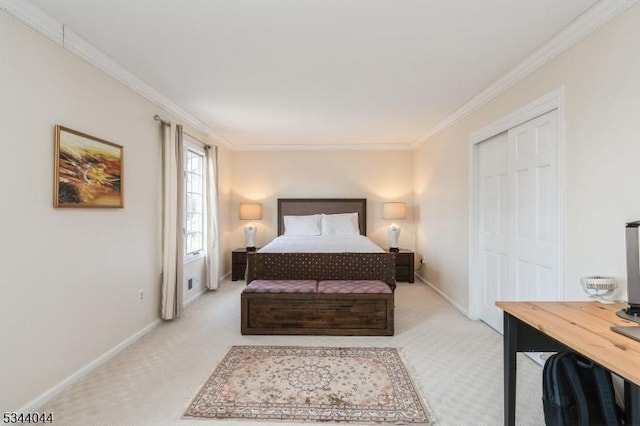 bedroom with crown molding, baseboards, a closet, and light carpet