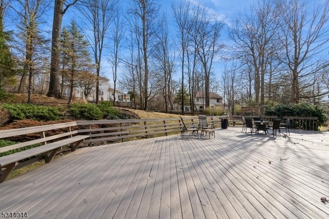 deck featuring outdoor dining area