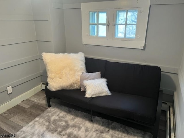 sitting room featuring wood finished floors