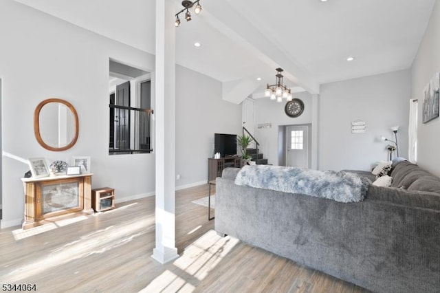 living room with beam ceiling, wood finished floors, recessed lighting, baseboards, and a chandelier