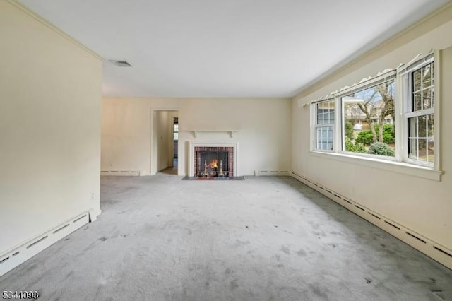 unfurnished living room featuring a baseboard heating unit, carpet, a fireplace, and baseboard heating