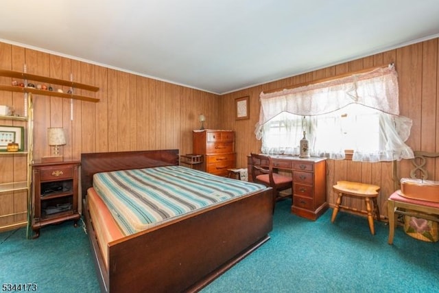 carpeted bedroom featuring wooden walls