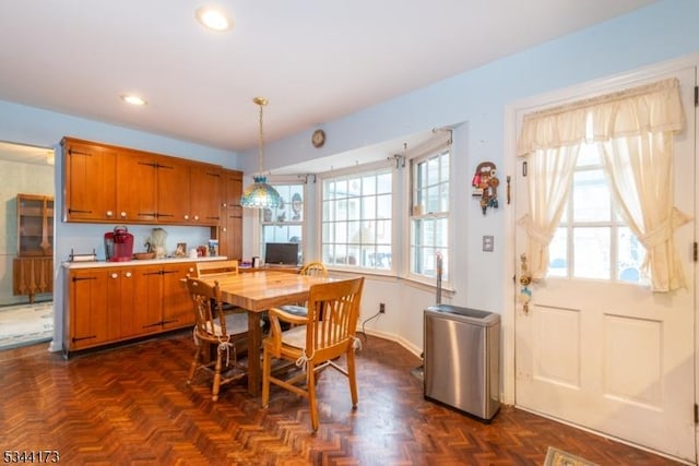 dining area featuring baseboards and recessed lighting