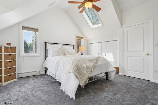118 Indian Run Pkwy, Union Twp, NJ 07083 - carpeted bedroom with visible vents, a baseboard heating unit, vaulted ceiling with skylight, and multiple windows