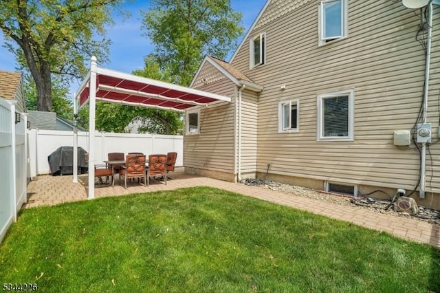 118 Indian Run Pkwy, Union Twp, NJ 07083 - rear view of house with a lawn, a fenced backyard, and a patio area