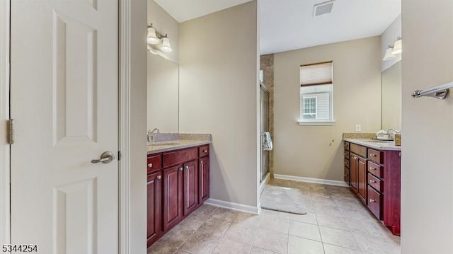 full bath featuring visible vents, a shower stall, and vanity