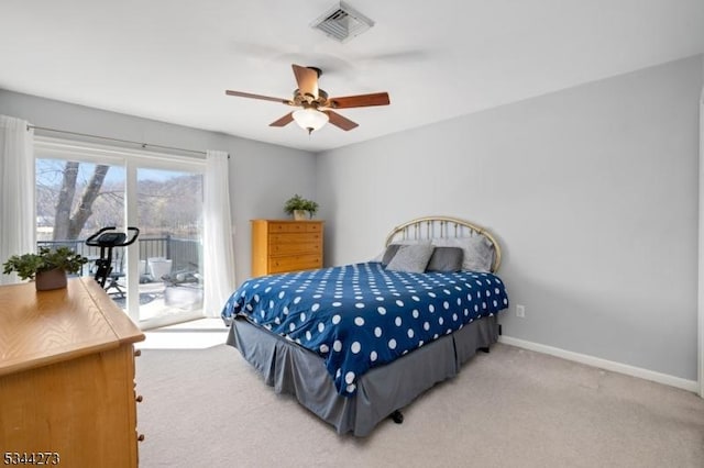 bedroom featuring baseboards, light carpet, visible vents, access to exterior, and ceiling fan