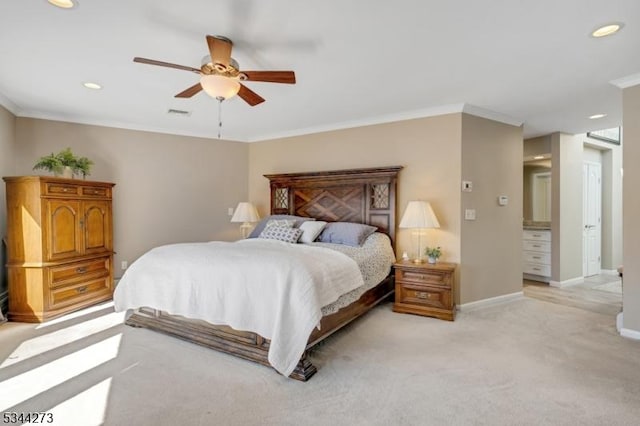 bedroom with recessed lighting, light colored carpet, baseboards, and crown molding