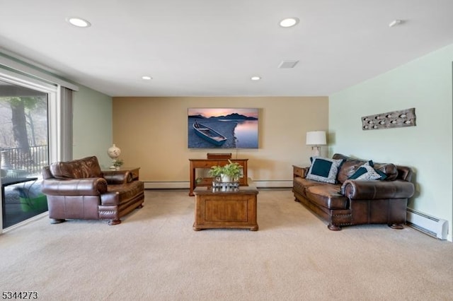 living area with a baseboard radiator, recessed lighting, and light colored carpet