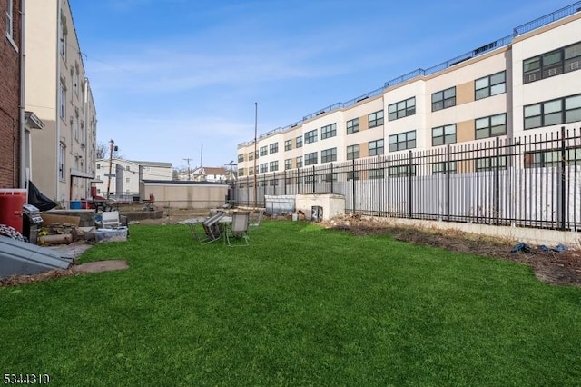 view of yard with fence