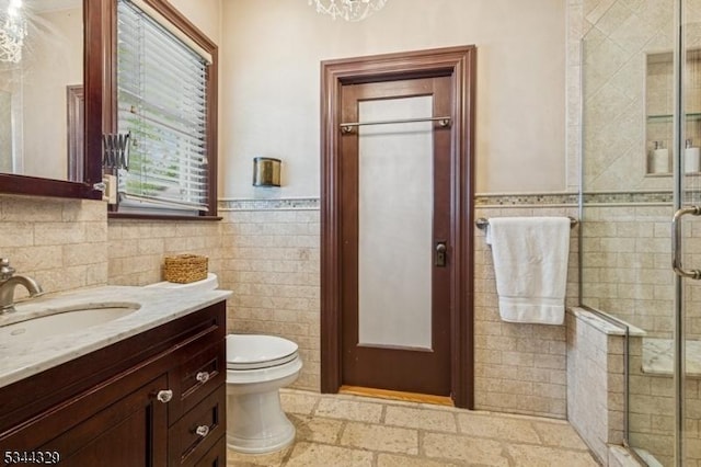 274 Ridgewood Ave, Glen Ridge Boro Twp, NJ 07028 - full bath featuring tile walls, vanity, a shower stall, toilet, and wainscoting