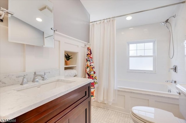 bathroom featuring vanity, toilet, tile patterned floors, shower / bath combination with curtain, and visible vents