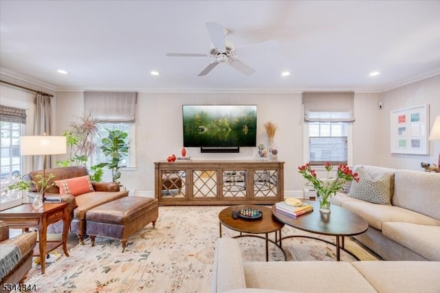 living room with ceiling fan, ornamental molding, recessed lighting, and wood finished floors