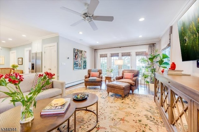 living room featuring crown molding, ceiling fan, recessed lighting, a baseboard radiator, and light wood-style flooring