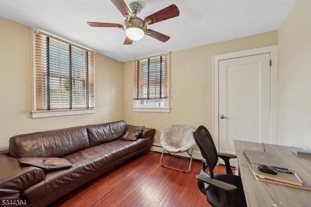 office space with hardwood / wood-style floors and a ceiling fan