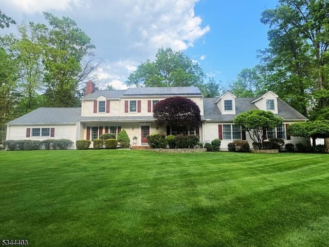 38 Beverly Dr, Hillsborough Twp, NJ 08844 - view of front of property featuring a front lawn and a chimney