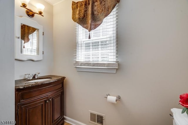 38 Beverly Dr, Hillsborough Twp, NJ 08844 - half bath featuring plenty of natural light, vanity, toilet, and baseboards