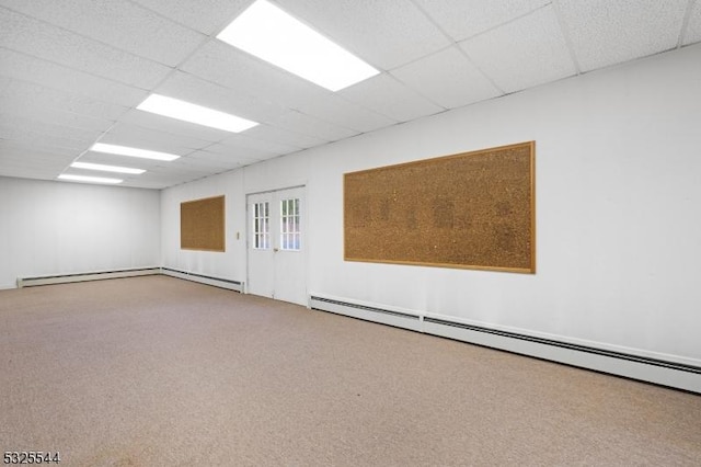 159 US Highway 206, Sandyston Twp, NJ 07826 - carpeted empty room with a baseboard heating unit, a drop ceiling, and baseboard heating