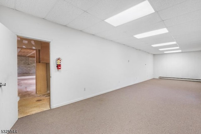 159 US Highway 206, Sandyston Twp, NJ 07826 - carpeted spare room featuring a baseboard heating unit and a drop ceiling