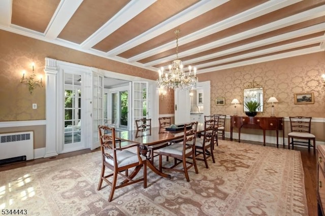 dining area featuring radiator, beamed ceiling, wallpapered walls, french doors, and a notable chandelier