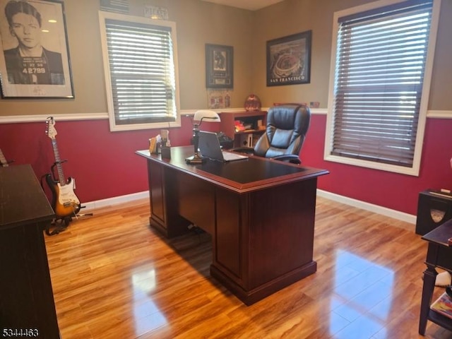 office with baseboards and light wood-type flooring