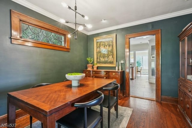 516 Hillcrest Ave, Westfield Town, NJ 07090 - dining space with ornamental molding and dark wood-style floors