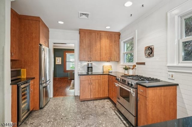 516 Hillcrest Ave, Westfield Town, NJ 07090 - kitchen with stainless steel appliances, beverage cooler, ornamental molding, dark countertops, and brown cabinets