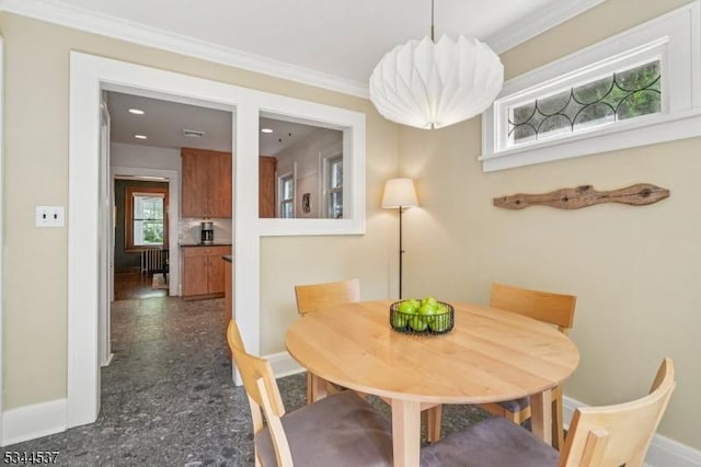 516 Hillcrest Ave, Westfield Town, NJ 07090 - dining space with baseboards and crown molding