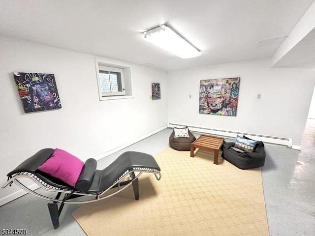 living area with baseboards and baseboard heating