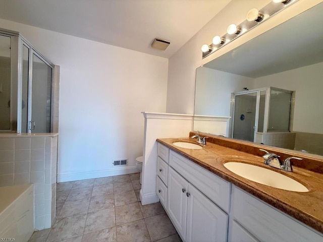 404 Azalea Ter, Branchburg Twp, NJ 08876 - full bathroom with double vanity, a shower stall, a bath, and tile patterned floors