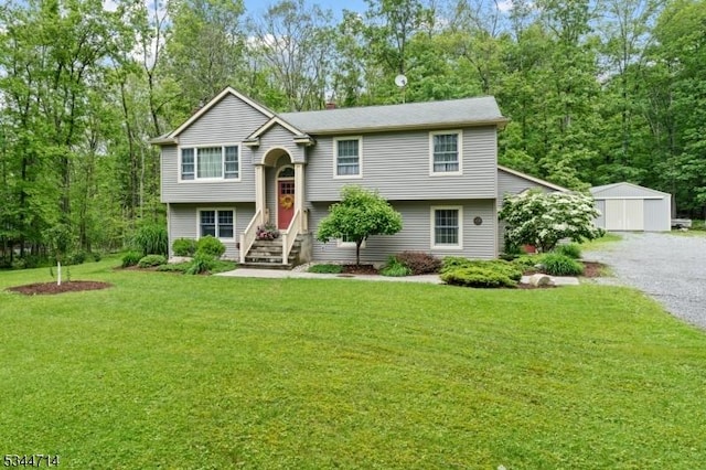 23 Devita Rd, Sandyston Twp, NJ 07826 - bi-level home featuring a front lawn, a chimney, and an outdoor structure