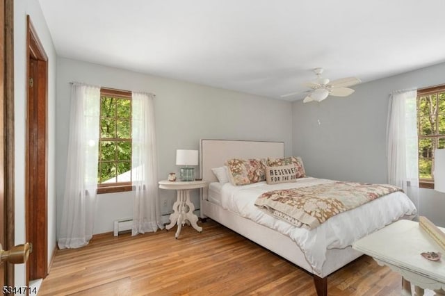 23 Devita Rd, Sandyston Twp, NJ 07826 - bedroom with light wood-style floors and a ceiling fan