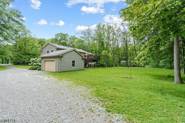 23 Devita Rd, Sandyston Twp, NJ 07826 - view of green lawn with driveway and a wooden deck