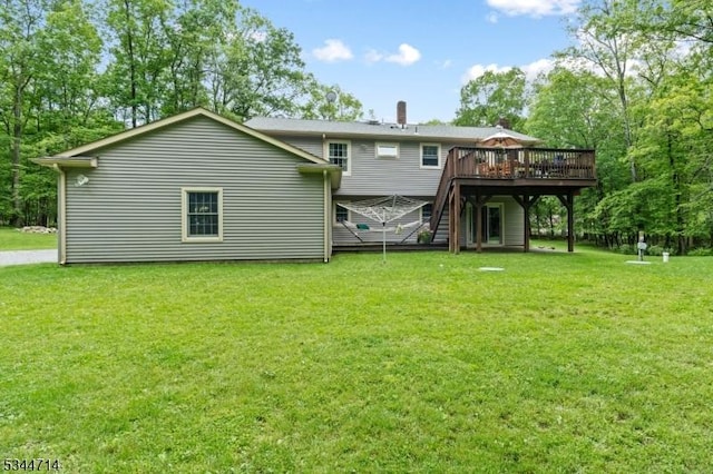 23 Devita Rd, Sandyston Twp, NJ 07826 - back of house with a wooden deck, stairway, and a lawn