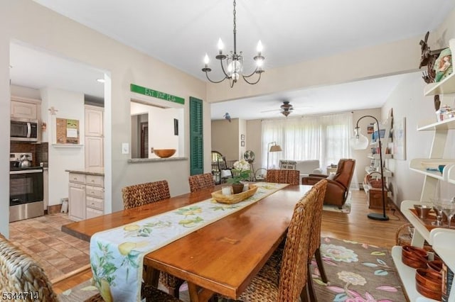 23 Devita Rd, Sandyston Twp, NJ 07826 - dining area featuring a chandelier, a ceiling fan, and light wood-style flooring
