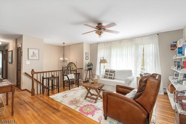 23 Devita Rd, Sandyston Twp, NJ 07826 - living room featuring light wood finished floors, a chandelier, and ceiling fan