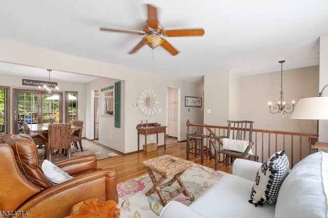 23 Devita Rd, Sandyston Twp, NJ 07826 - living area with a chandelier, light wood-style floors, and ceiling fan