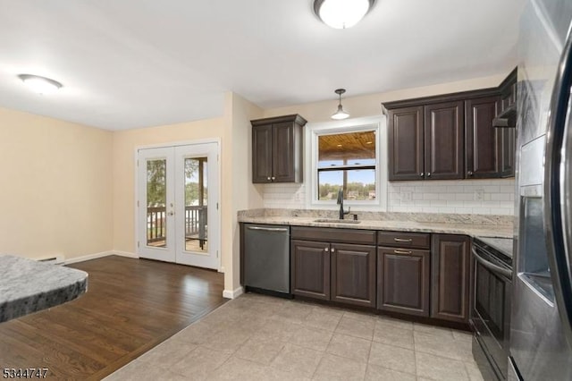 75 Shore Rd, Green Twp, NJ 07821 - kitchen with stainless steel appliances, a sink, french doors, and dark brown cabinets