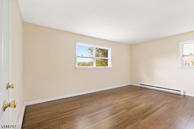 75 Shore Rd, Green Twp, NJ 07821 - spare room with a baseboard heating unit, wood finished floors, baseboards, and a baseboard radiator