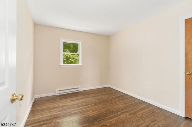 75 Shore Rd, Green Twp, NJ 07821 - spare room featuring baseboard heating, wood finished floors, and baseboards