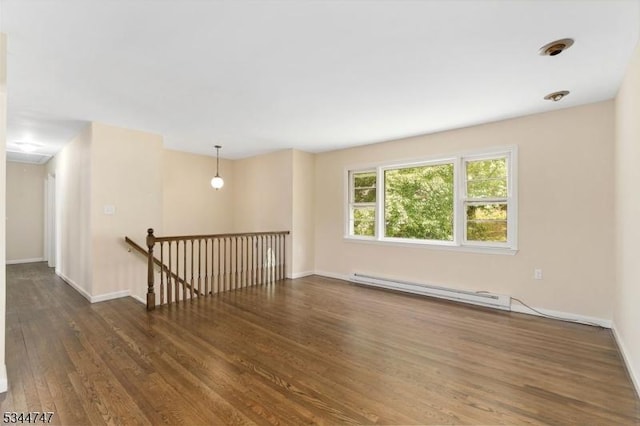75 Shore Rd, Green Twp, NJ 07821 - empty room featuring a baseboard radiator, wood finished floors, and baseboards
