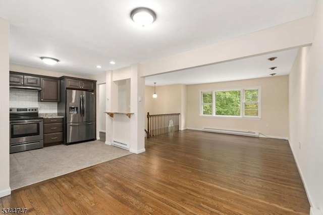 75 Shore Rd, Green Twp, NJ 07821 - kitchen featuring stainless steel appliances, open floor plan, a baseboard heating unit, and dark brown cabinetry
