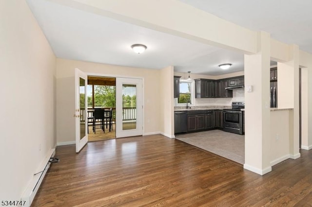 75 Shore Rd, Green Twp, NJ 07821 - kitchen with range with electric stovetop, light countertops, dishwasher, dark wood-style floors, and fridge