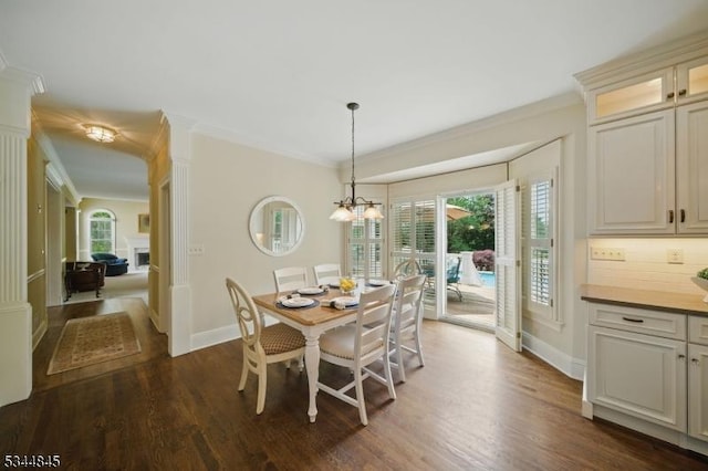 2 Wakefield Dr, Washington Twp, NJ 07840 - dining space with crown molding, dark wood finished floors, and a chandelier