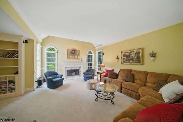 2 Wakefield Dr, Washington Twp, NJ 07840 - carpeted living area featuring a high end fireplace, lofted ceiling, and ornamental molding