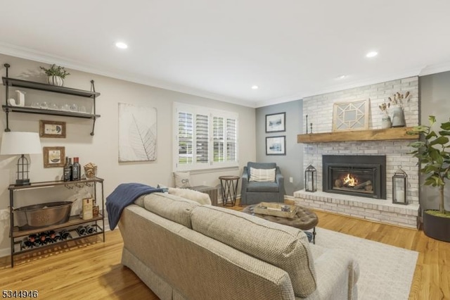 2 Columbia Dr, Bernardsville Boro, NJ 07924 - living area featuring ornamental molding, a brick fireplace, wood finished floors, and recessed lighting