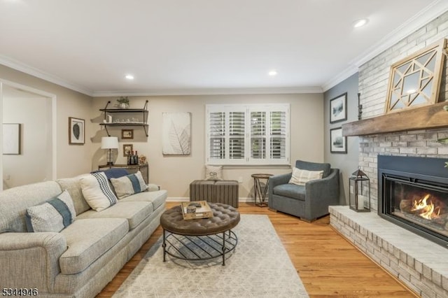 2 Columbia Dr, Bernardsville Boro, NJ 07924 - living area with a brick fireplace, wood finished floors, crown molding, recessed lighting, and baseboards
